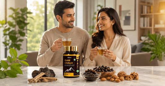 Nonu Gold Shilajit supplement bottle with a healthy Indian man and woman enjoying herbal tea in a premium wellness setting, representing natural energy, vitality, and overall health.